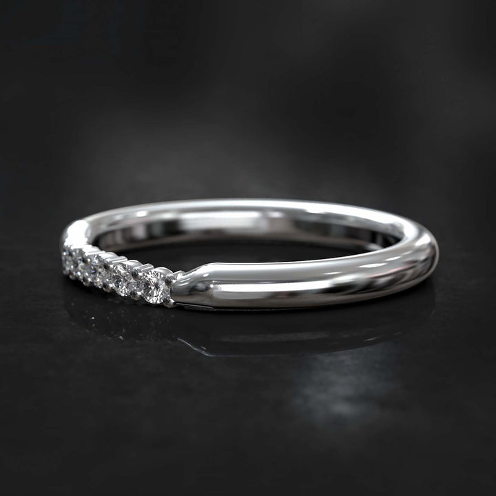 Round-profile band with six sparkling lab-grown diamonds on top, featuring a subtle curve and thicker design.