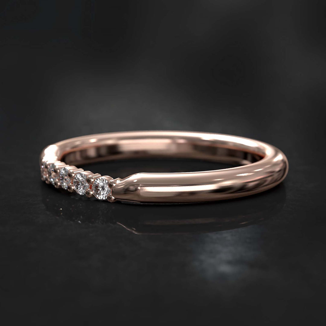 Round-profile band with six sparkling lab-grown diamonds on top, featuring a subtle curve and thicker design.