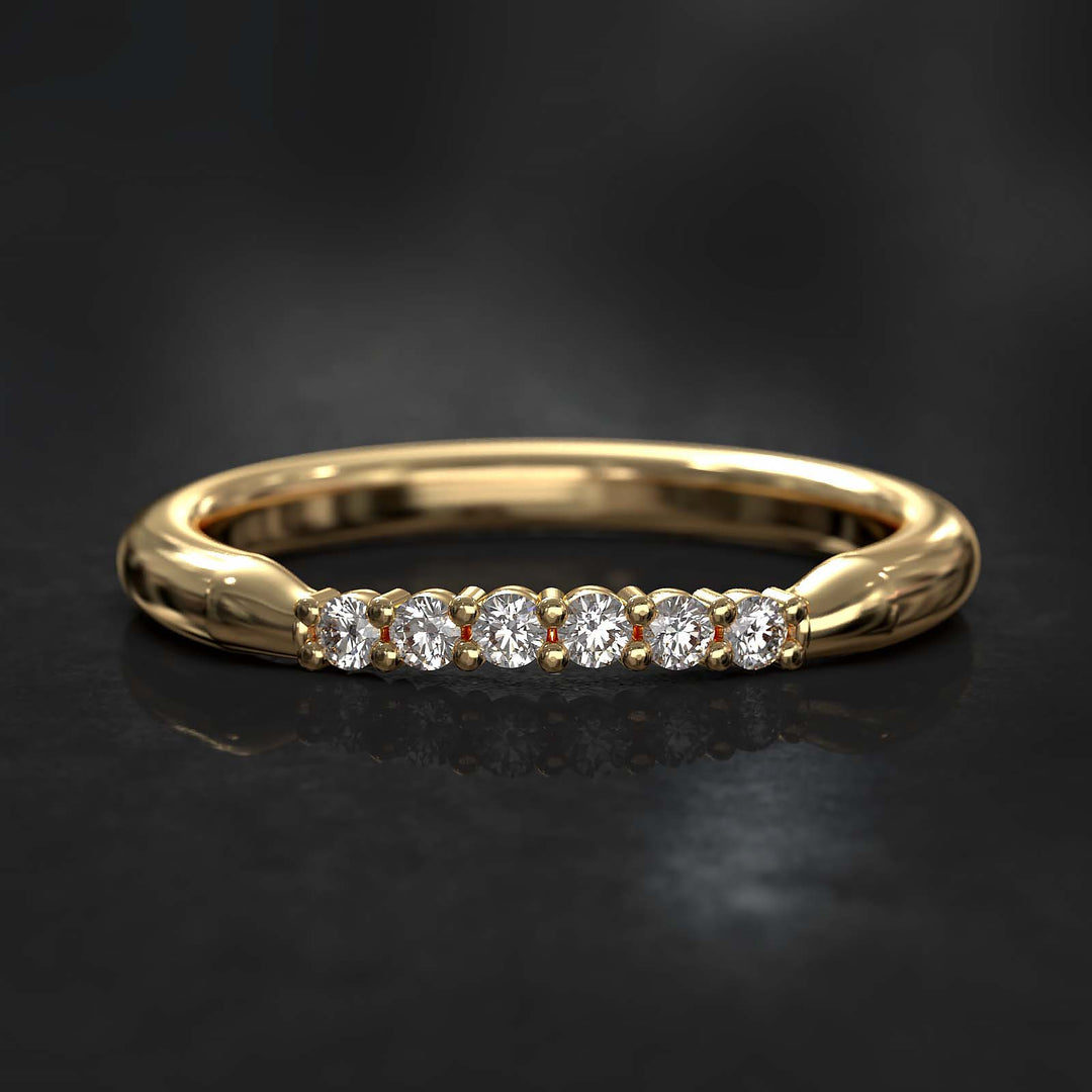 Round-profile band with six sparkling lab-grown diamonds on top, featuring a subtle curve and thicker design.