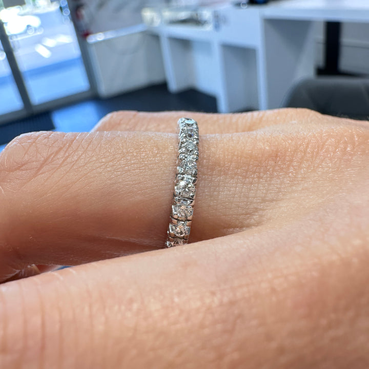 elegance of our 0.72 ct natural diamond eternity wedding band