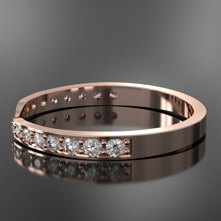 Channel-set tapered lab-grown diamond wedding band with sleek design and premium finish.