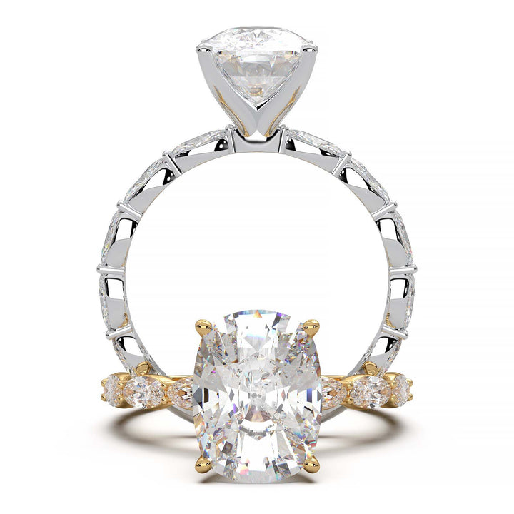 Low-setting engagement ring with 3.6 carat elongated cushion cut diamond and oval lab-grown diamond accents.