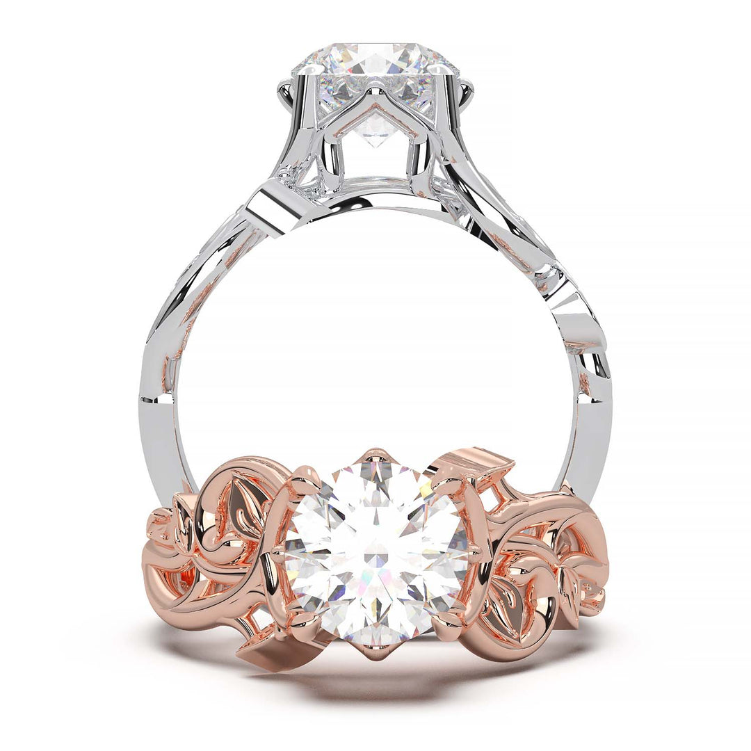 Engagement ring with a 1-carat round-cut lab grown diamond and intricate vine design.