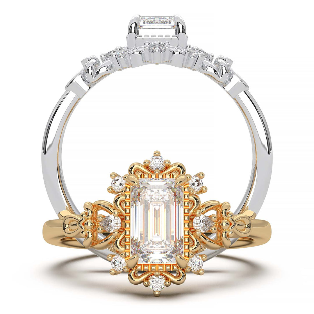 Vintage engagement ring with emerald cut diamond and filigree details.