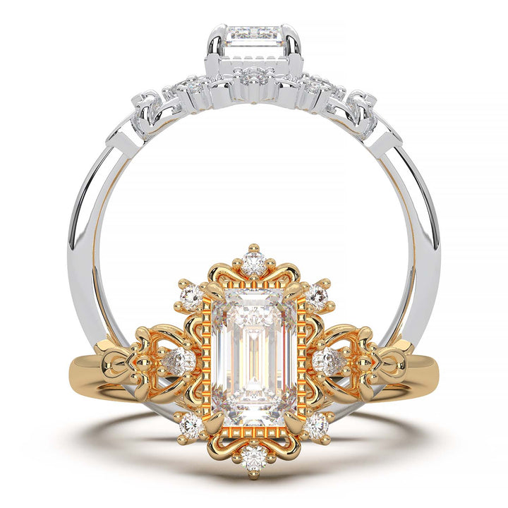 Vintage engagement ring with emerald cut diamond and filigree details.