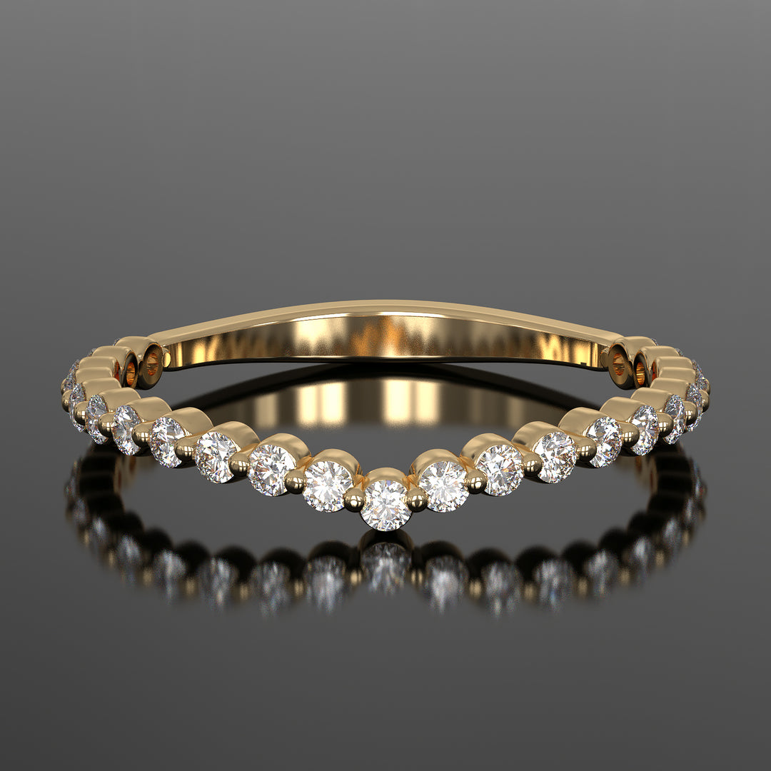 Floating lab grown diamond V-shaped wedding band with shared prong setting.