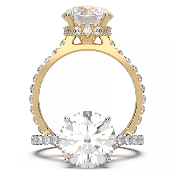 Round lab grown diamond ring with hidden halo, cathedral setting, and pave-set band.