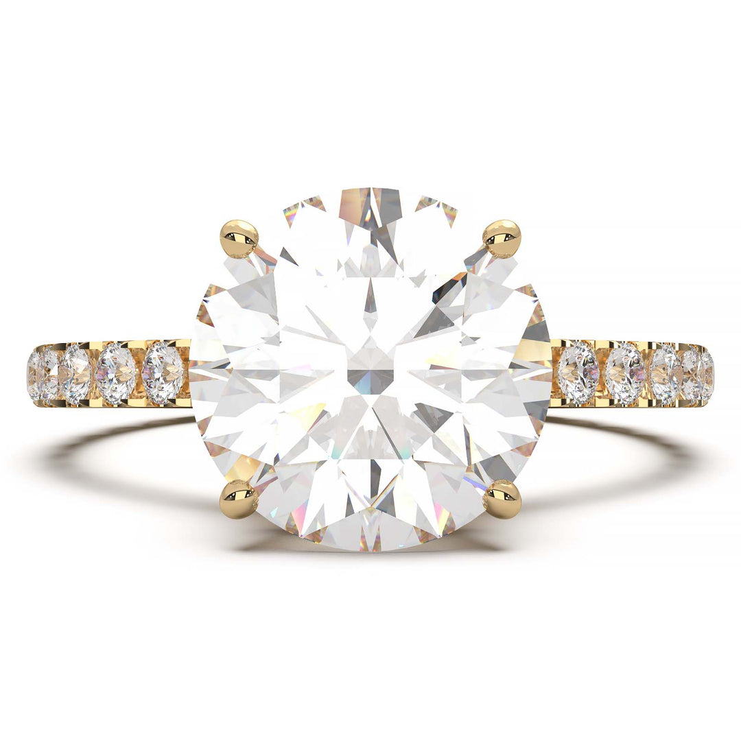 Round lab grown diamond ring with hidden halo, cathedral setting, and pave-set band.