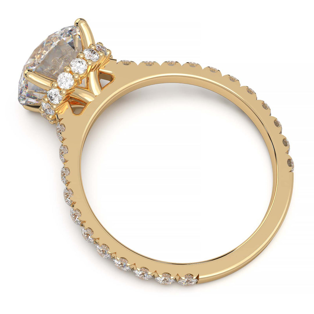 Round lab grown diamond ring with hidden halo, cathedral setting, and pave-set band.