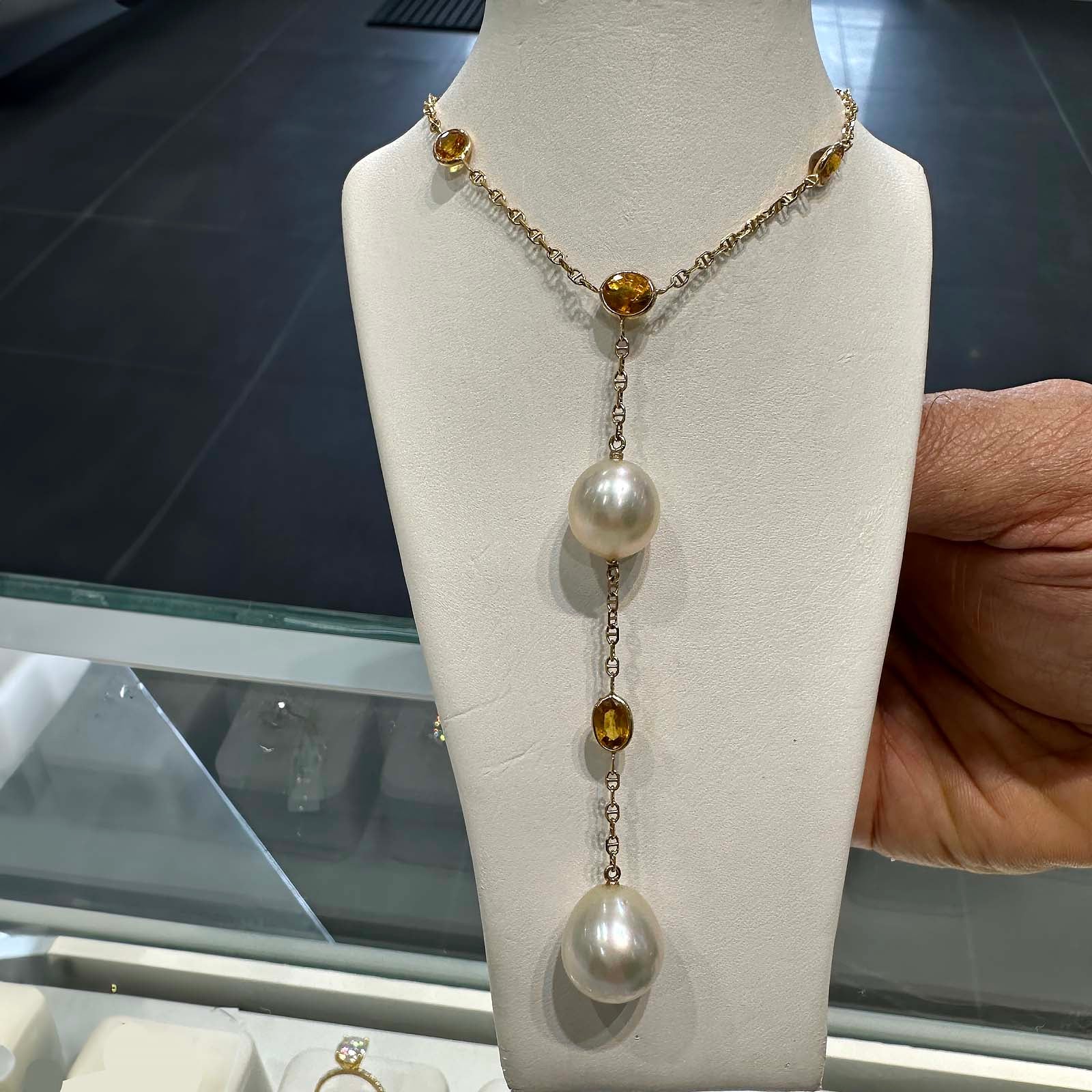 Handmade South Sea pearl necklace with 12.3mm and 11mm drop-shaped pearls, yellow sapphires, set in 14K yellow gold, custom made in Canada.