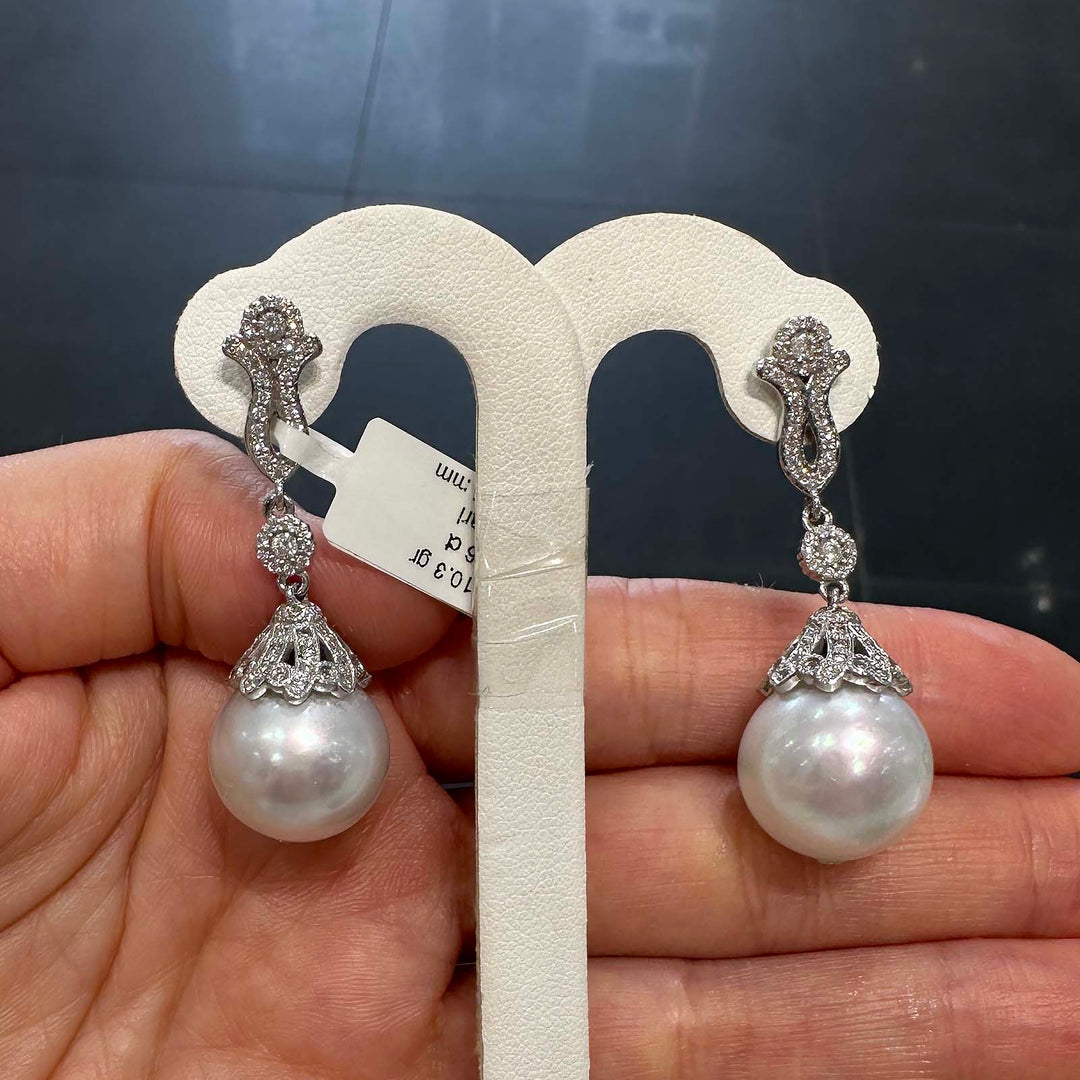 White South Sea pearl earrings with 15.5mm high luster pearls, 14K white gold, and 1.06 ct natural diamonds.