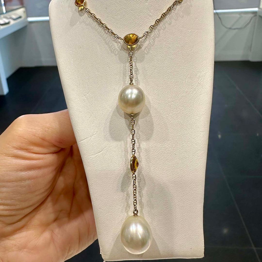 Handmade South Sea pearl necklace with 12.3mm and 11mm drop-shaped pearls, yellow sapphires, set in 14K yellow gold, custom made in Canada.