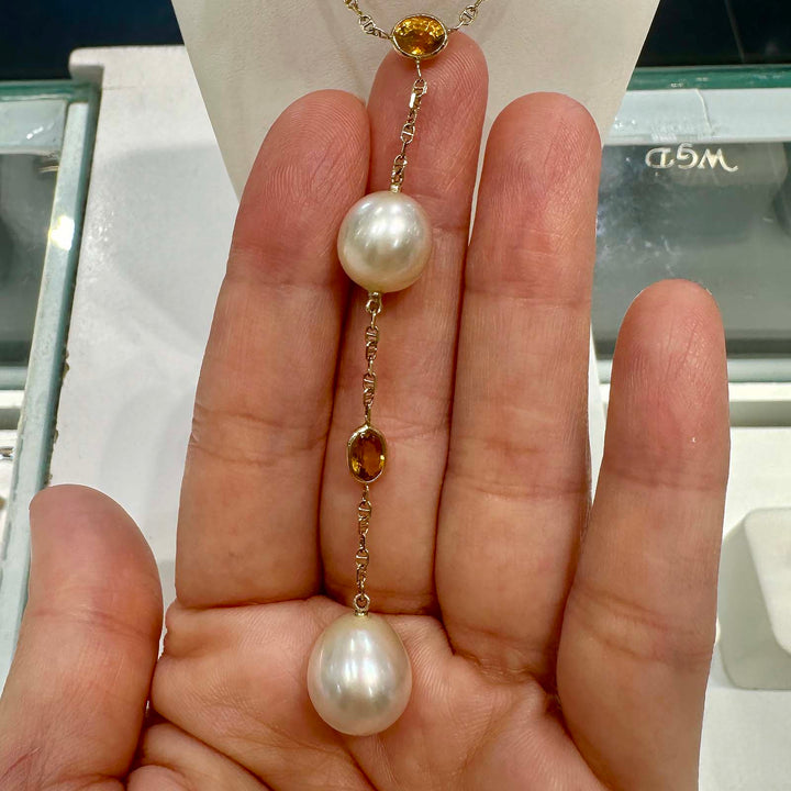 Handmade South Sea pearl necklace with 12.3mm and 11mm drop-shaped pearls, yellow sapphires, set in 14K yellow gold, custom made in Canada.