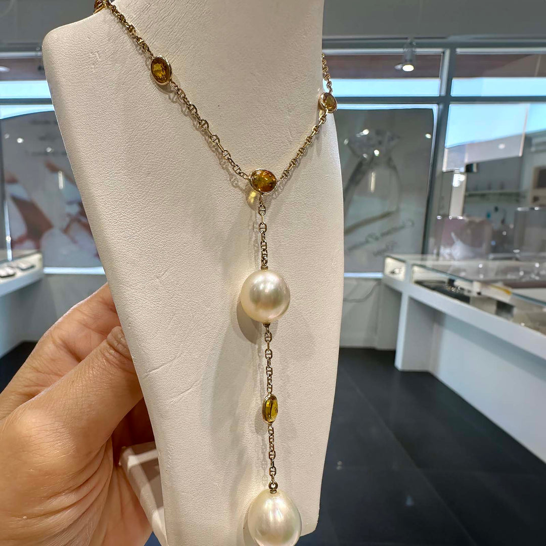 Handmade South Sea pearl necklace with 12.3mm and 11mm drop-shaped pearls, yellow sapphires, set in 14K yellow gold, custom made in Canada.