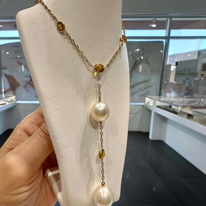 Handmade South Sea pearl necklace with 12.3mm and 11mm drop-shaped pearls, yellow sapphires, set in 14K yellow gold, custom made in Canada.