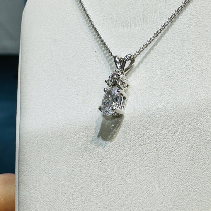 14K white gold pendant with cubic zirconia and natural diamond on an 18" 14K white gold box chain, perfect for April birthstone gifts.