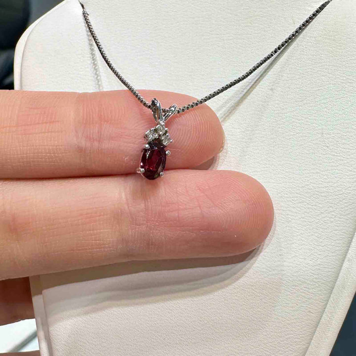 14K white gold pendant with genuine garnet and natural diamond on an 18" 14K white gold box chain, perfect for January birthstone gifts.