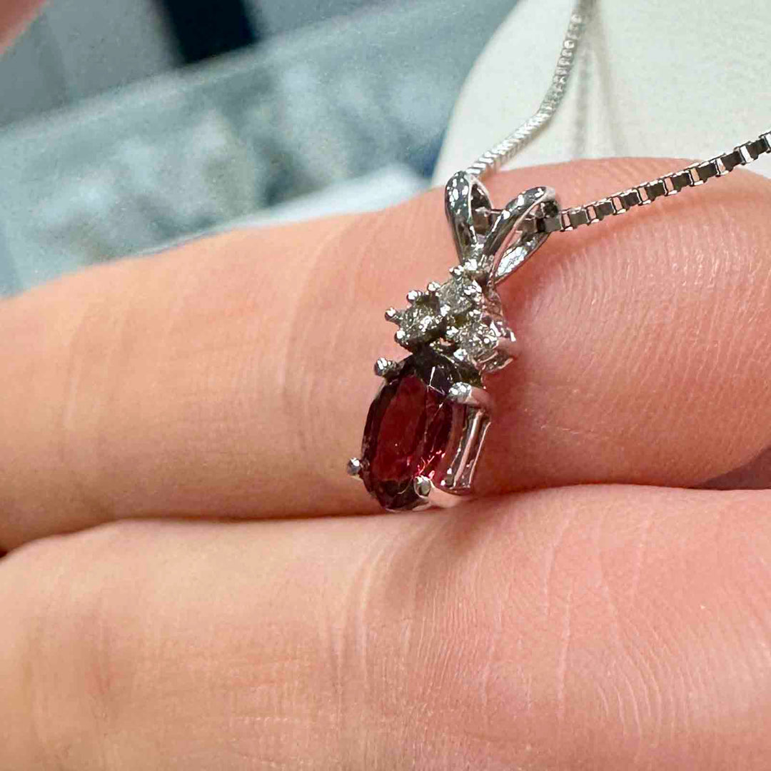 14K white gold pendant with genuine garnet and natural diamond on an 18" 14K white gold box chain, perfect for January birthstone gifts.