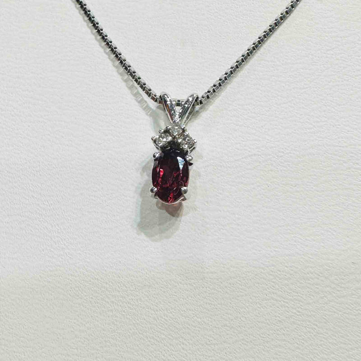 14K white gold pendant with genuine garnet and natural diamond on an 18" 14K white gold box chain, perfect for January birthstone gifts.