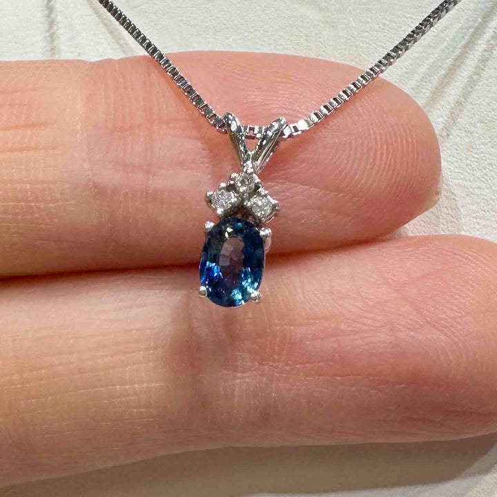 14K white gold pendant with 0.64 ct natural blue sapphire and natural diamond on an 18" 14K white gold box chain, perfect for September birthstone gifts.