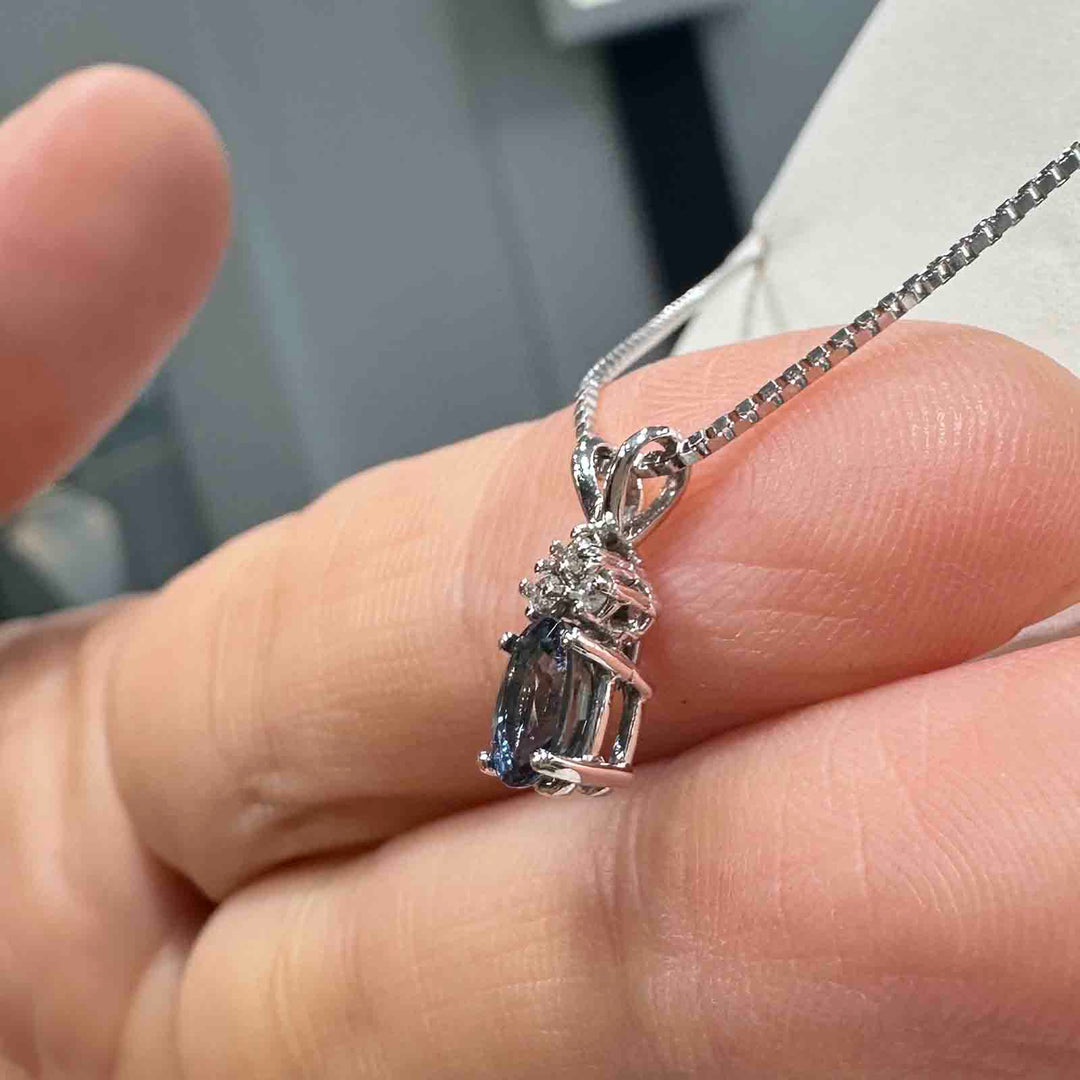 14K white gold pendant with 0.64 ct natural blue sapphire and natural diamond on an 18" 14K white gold box chain, perfect for September birthstone gifts.