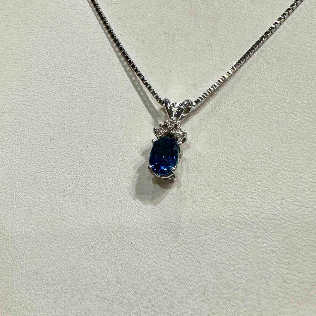 14K white gold pendant with 0.64 ct natural blue sapphire and natural diamond on an 18" 14K white gold box chain, perfect for September birthstone gifts.