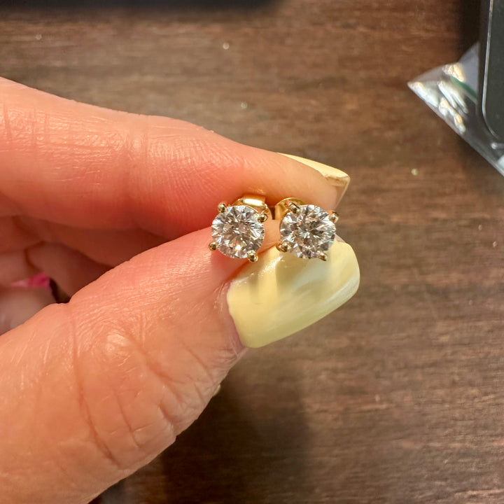 Certified round lab grown diamond stud earrings in 14K yellow gold prong setting

