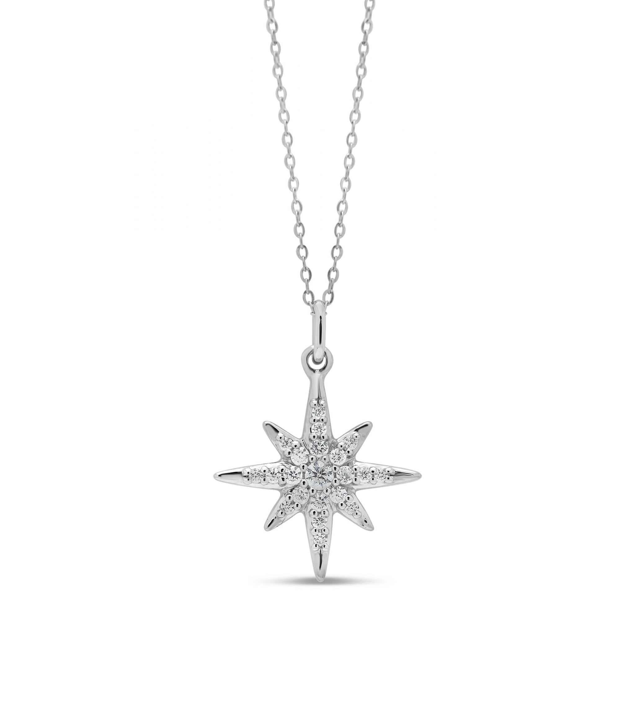 Elegant 10K white gold North Star pendant adorned with 0.10 ct of diamonds, hanging on a matching white gold chain, ideal for a touch of celestial charm.