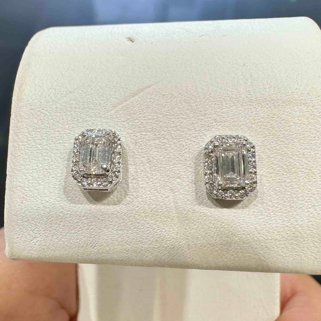 10K gold stud earrings with emerald-cut lab diamonds, VVS clarity, G-H color, and halo setting.