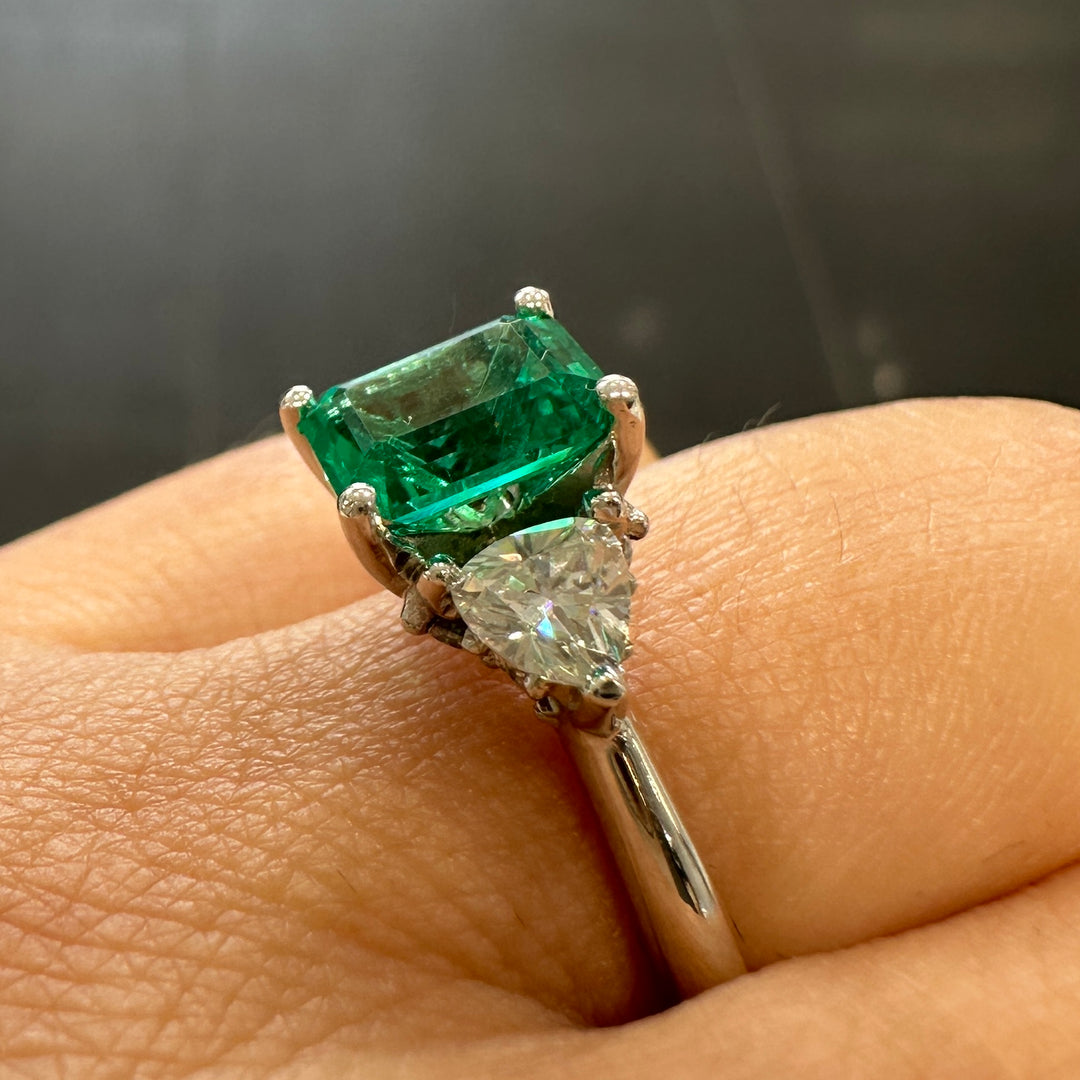 Lab-grown emerald and trillion moissanite ring in 14K white gold