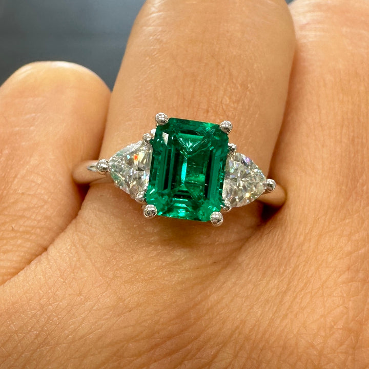 Lab-grown emerald and trillion moissanite ring in 14K white gold