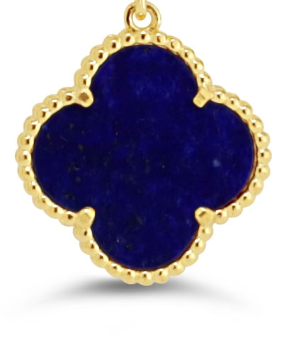 Gold and lapis lazuli four-leaf clover earring with beaded gold detailing.