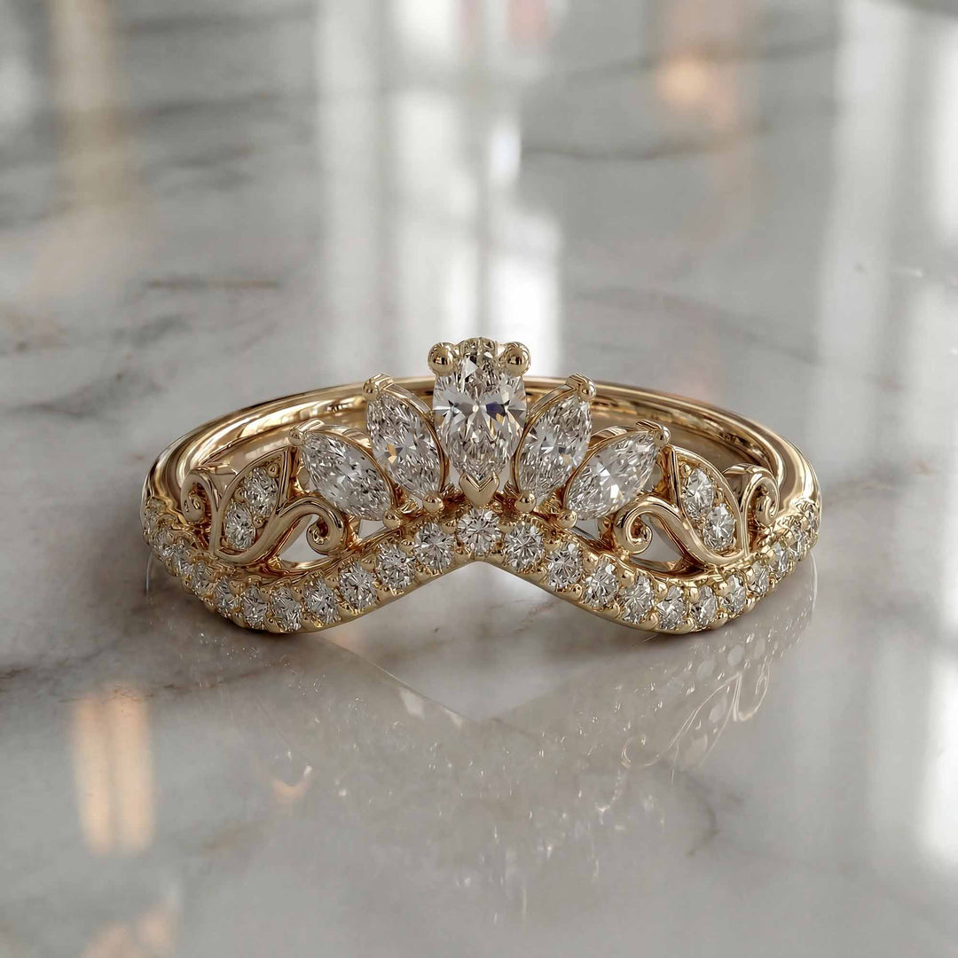 Marquise-style curved lab-grown diamond wedding band with round accent stones on display.