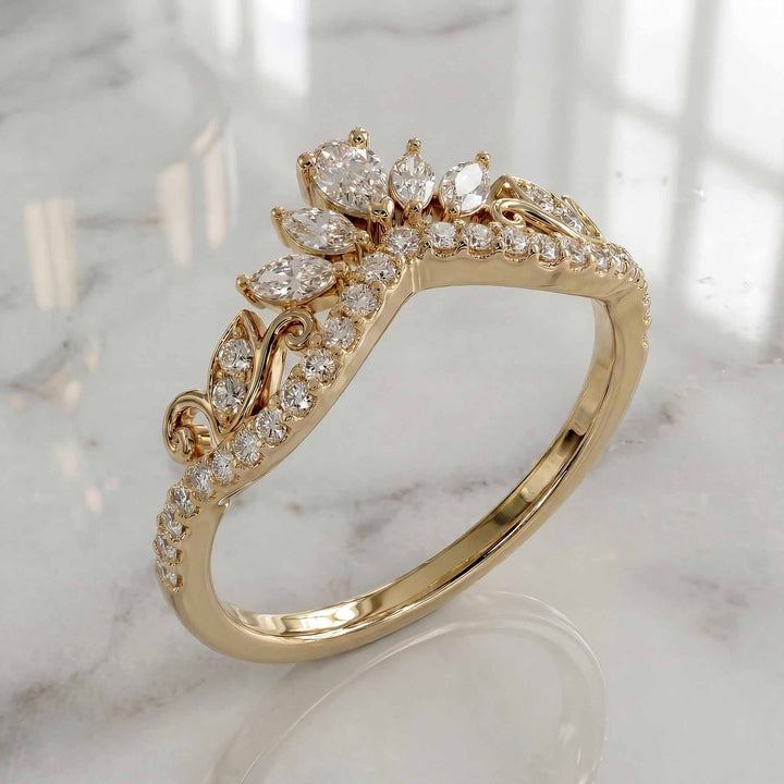 Marquise-style curved lab-grown diamond wedding band with round accent stones on display.