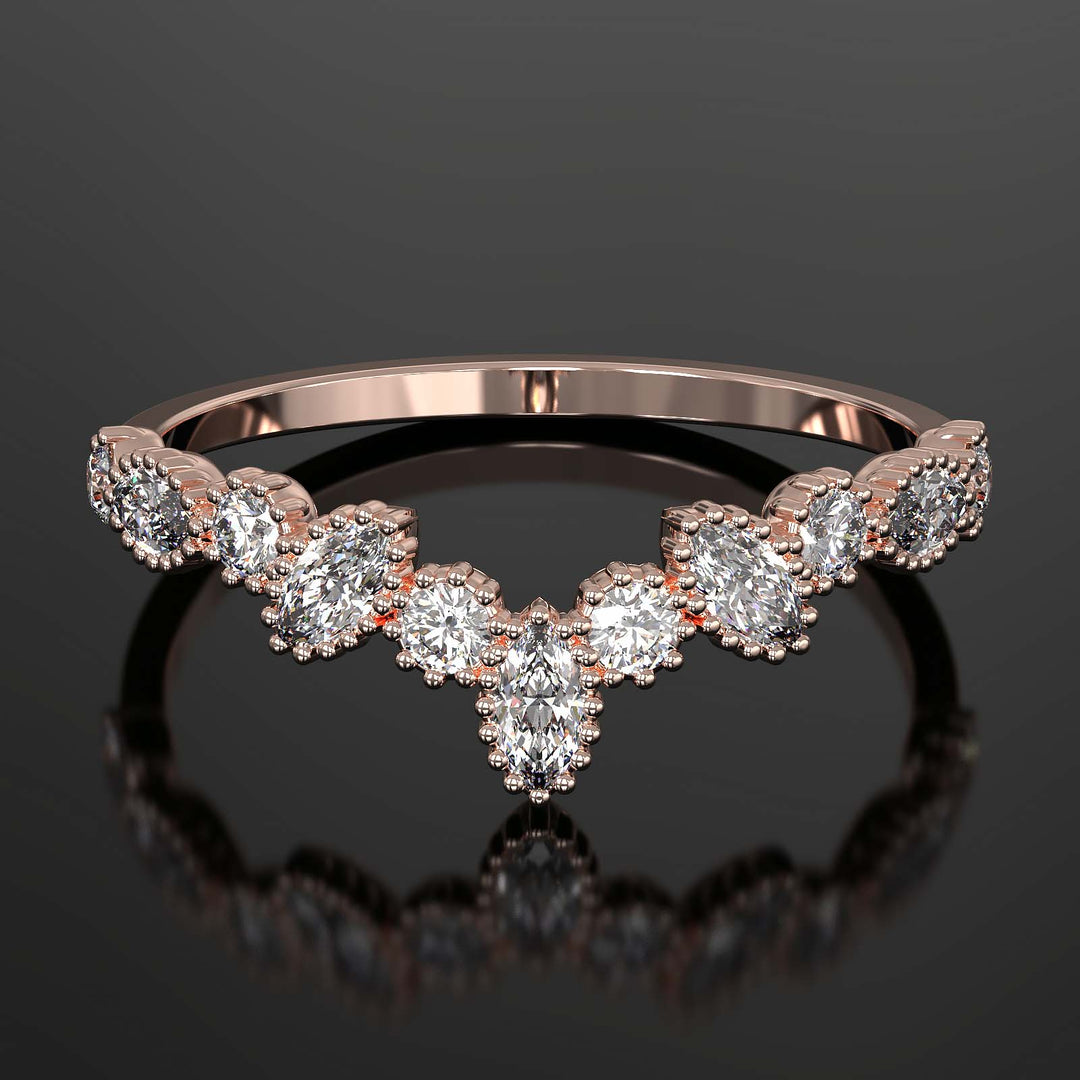 V-shaped wedding band with marquise and round lab-created diamonds and bead details, available in gold and platinum.