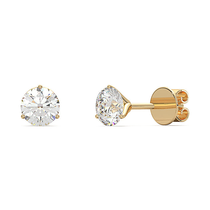 1 carat round lab-grown diamond martini stud earrings with three-prong setting.