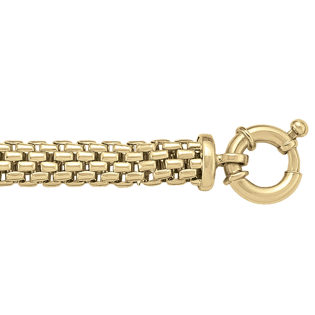 Close-up of a 14k yellow gold hollow mesh fancy link bracelet with a spring ring clasp.