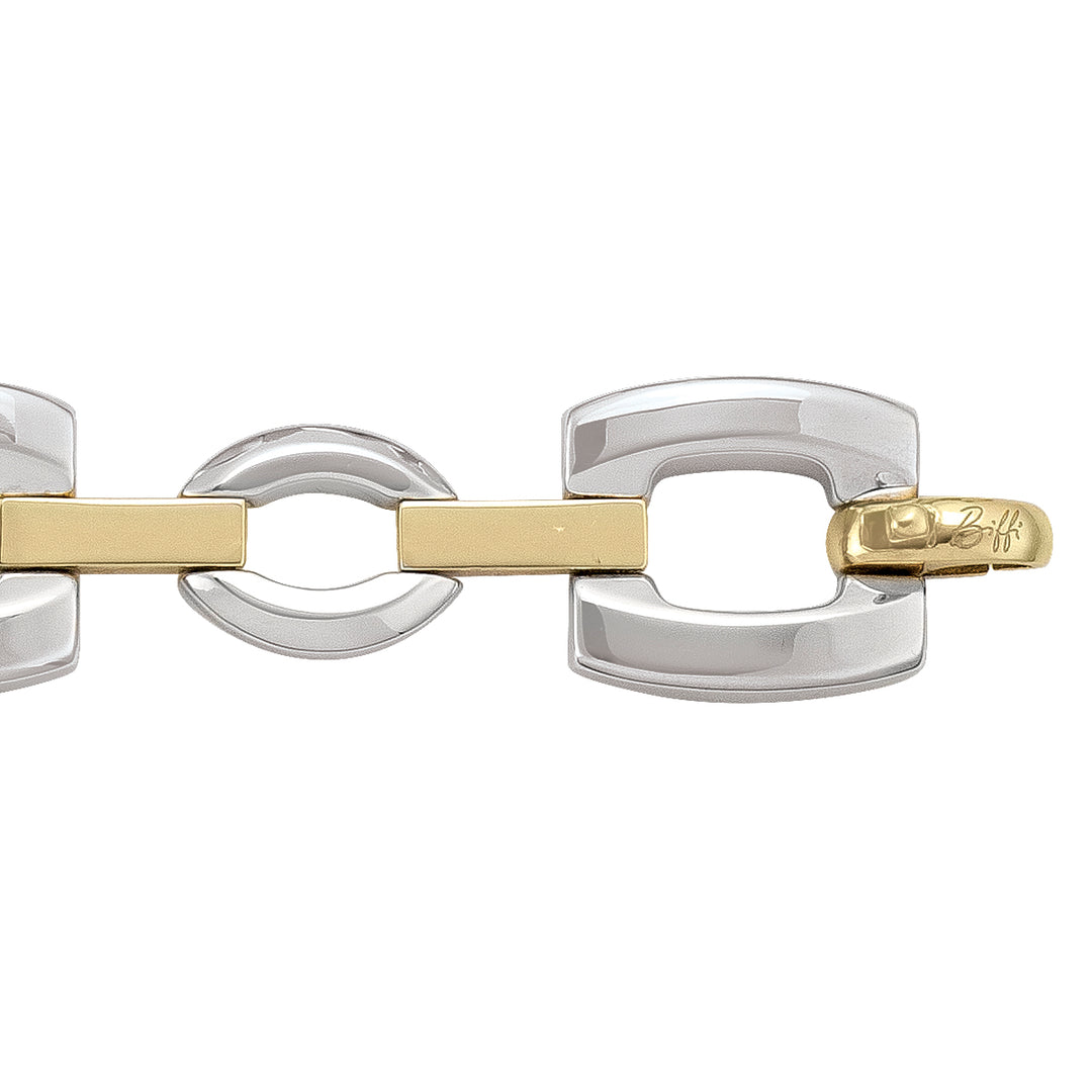 14k two-tone gold hollow fancy bracelet featuring bold, wide links with a sleek, modern design.