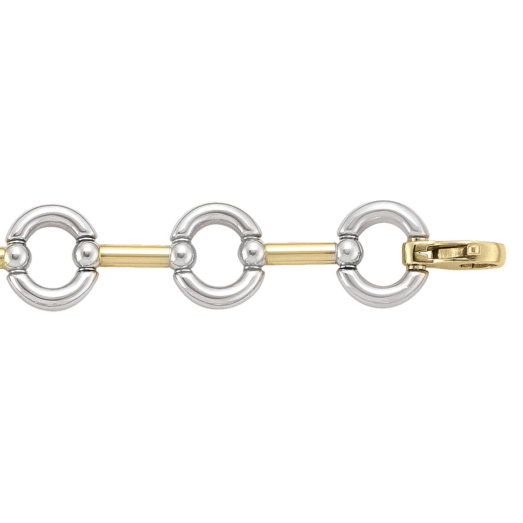 Two-tone 14k gold bracelet with circular and rectangular links, 7.5 inches long.