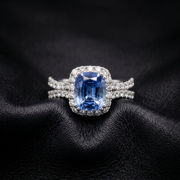 Cushion-cut 2.46 CT blue sapphire ring with 1.42 CT natural diamonds set in 14K white gold.