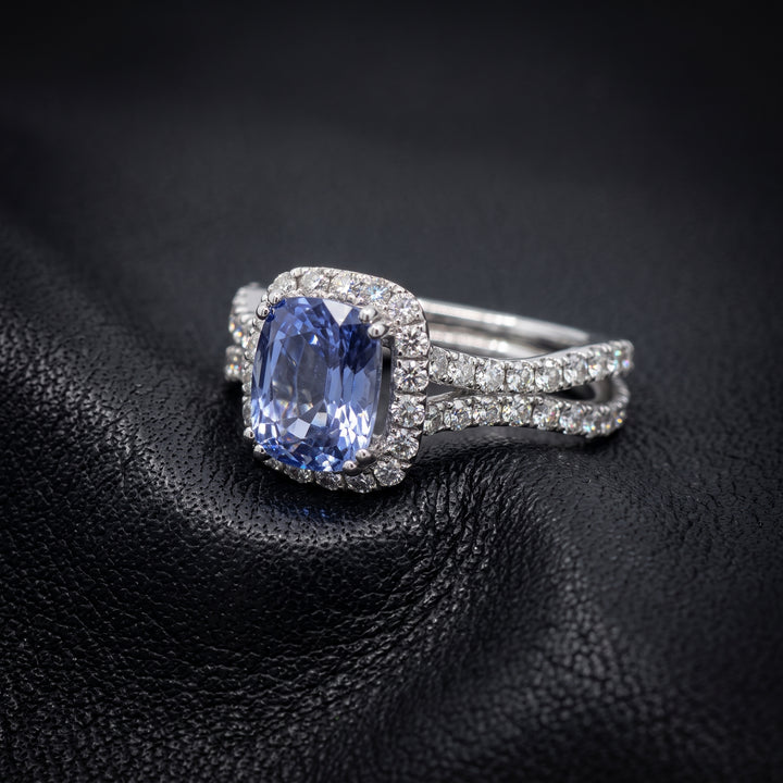 Cushion-cut 2.46 CT blue sapphire ring with 1.42 CT natural diamonds set in 14K white gold.