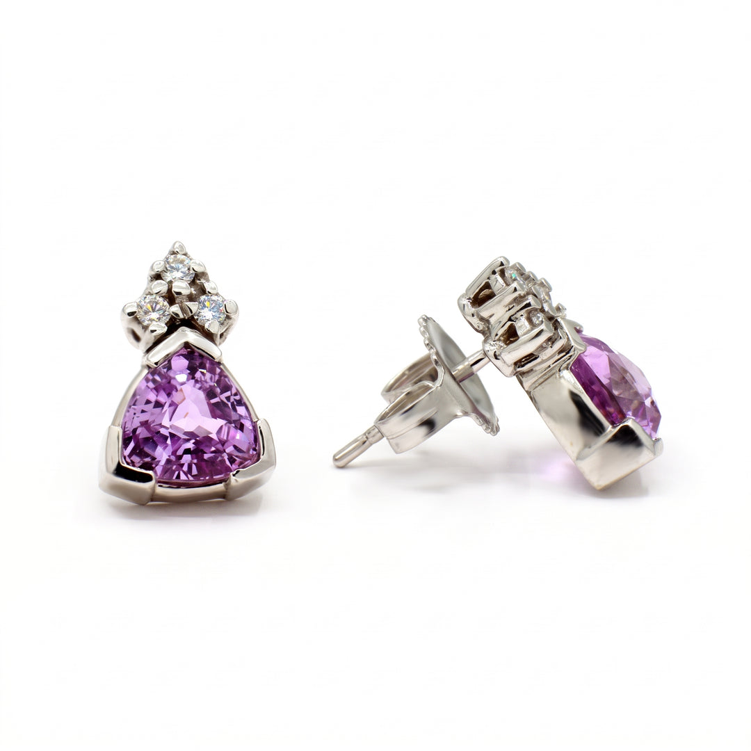 Trillion-cut purple sapphire and diamond stud earrings set in 14K white gold.