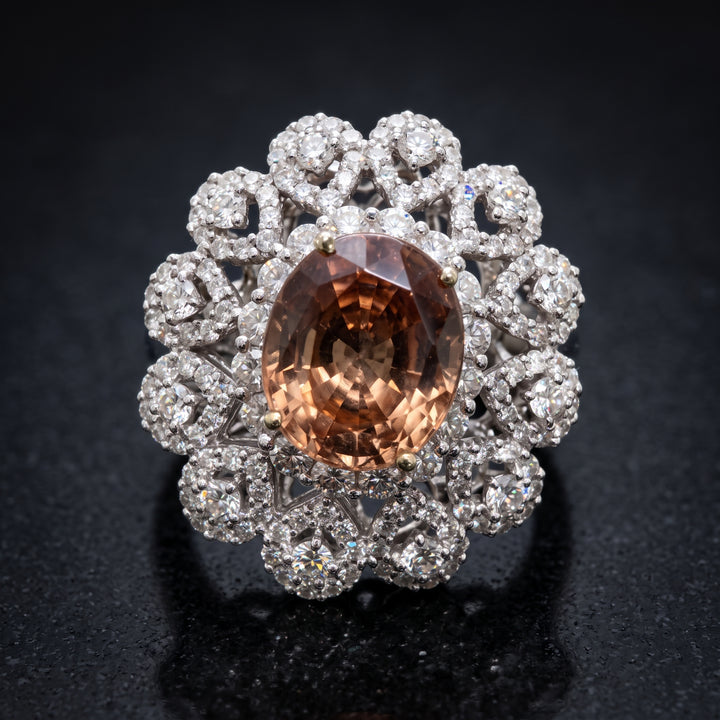 Natural Padparadscha sapphire ring with diamonds in 18K white gold