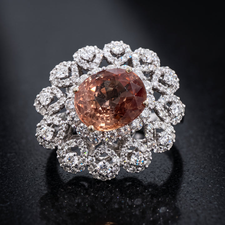 Natural Padparadscha sapphire ring with diamonds in 18K white gold