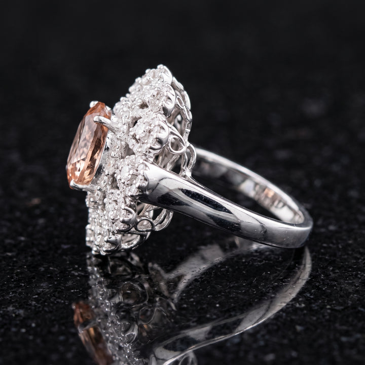 Natural Padparadscha sapphire ring with diamonds in 18K white gold