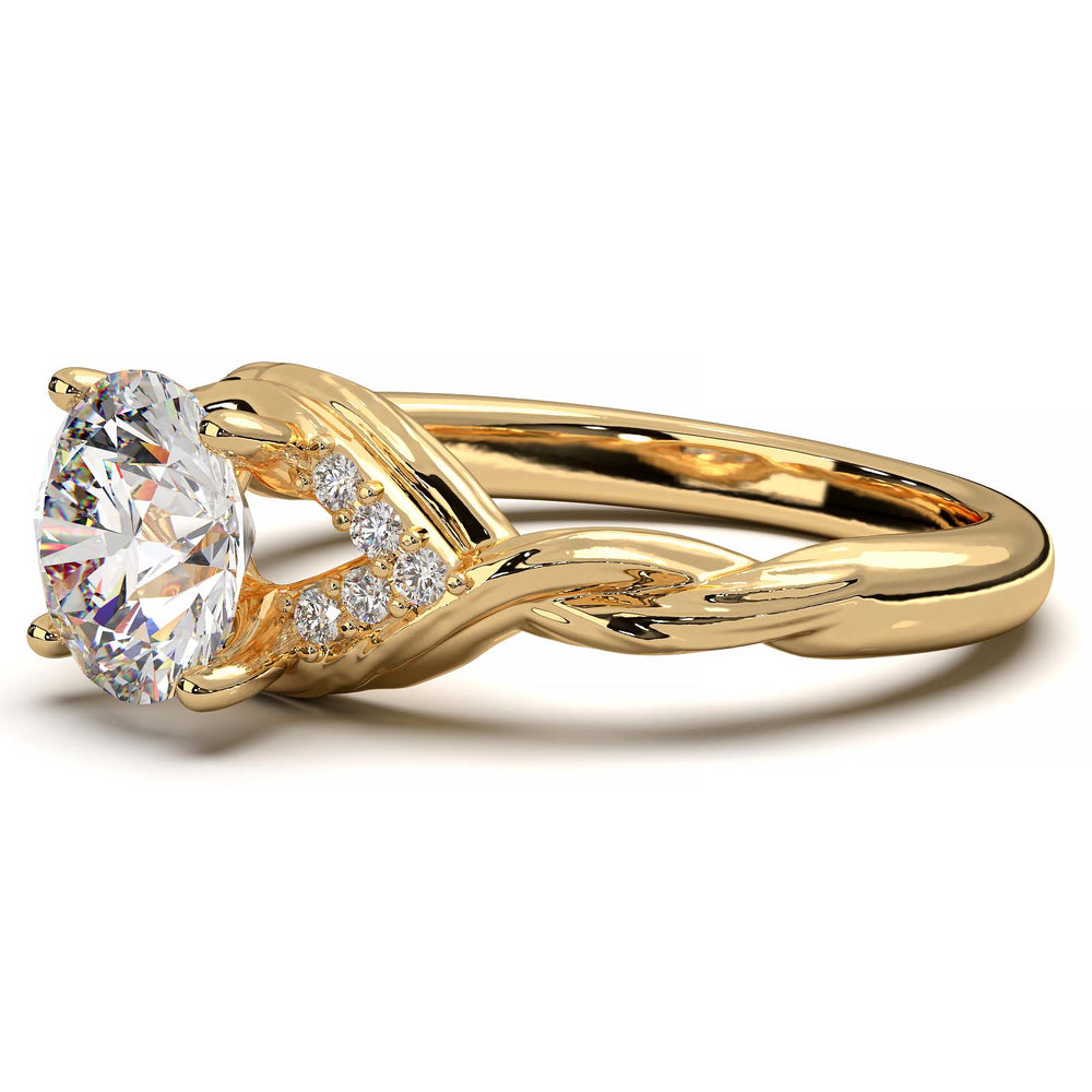 Twisted engagement ring with 1.2 carat round lab-grown diamond and side diamond clusters.