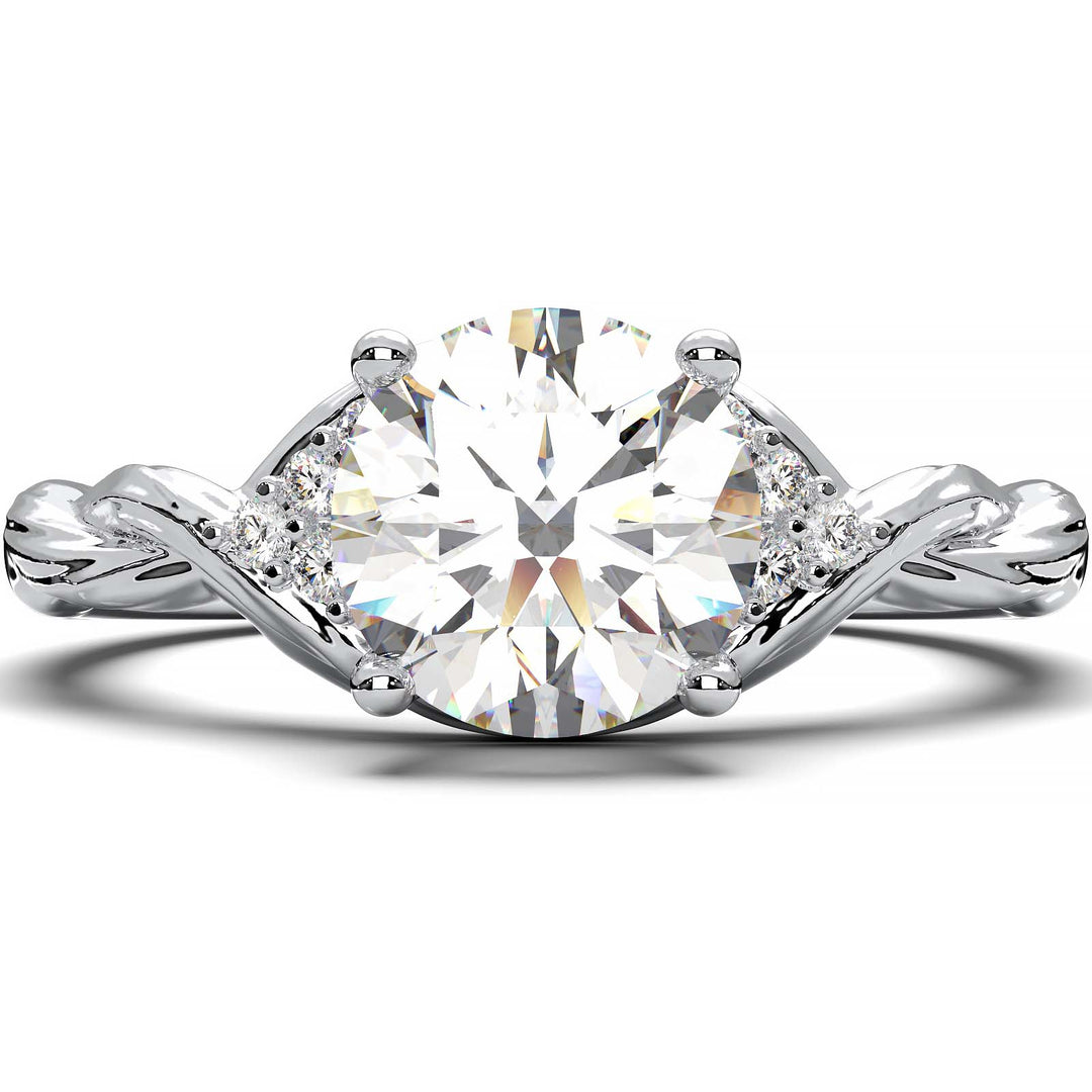 Twisted engagement ring with 1.2 carat round lab-grown diamond and side diamond clusters.