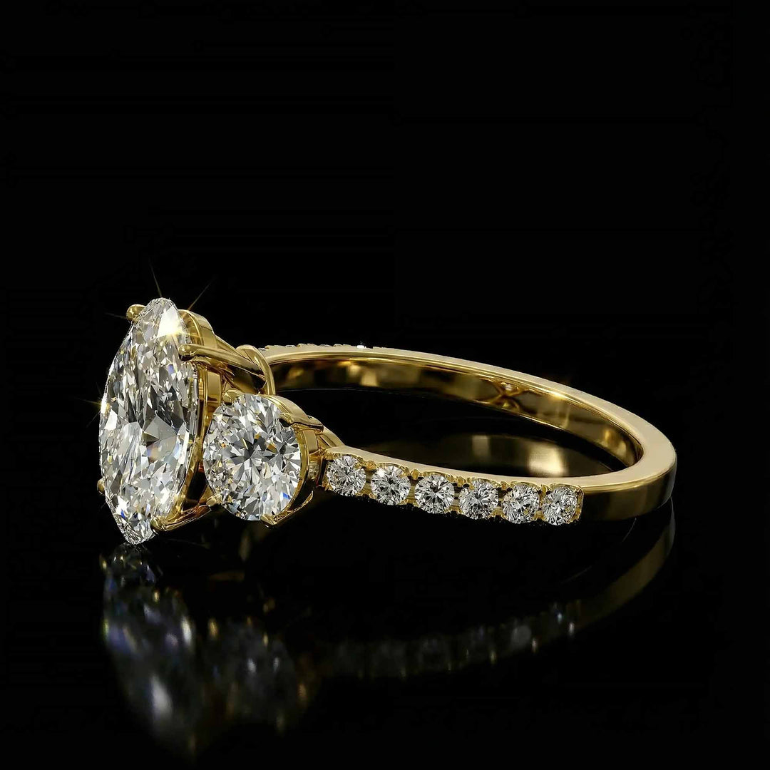 Oval diamond three stone engagement ring with round side stones and pavé band on display.
