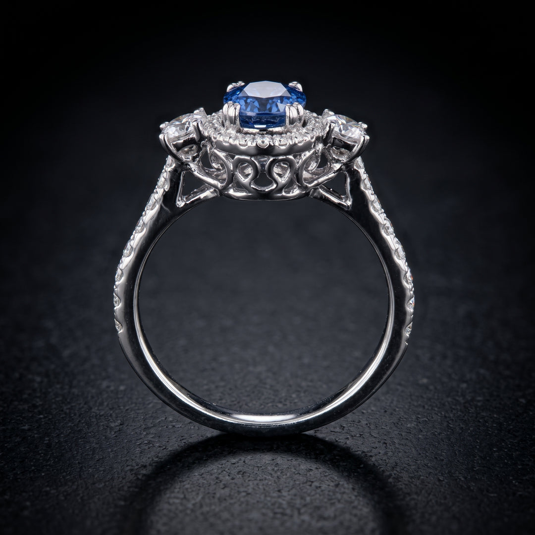 Stunning 14K Gold Oval Blue Sapphire Ring with Halo and Side Stones