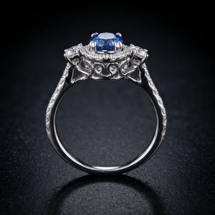 Stunning 14K Gold Oval Blue Sapphire Ring with Halo and Side Stones